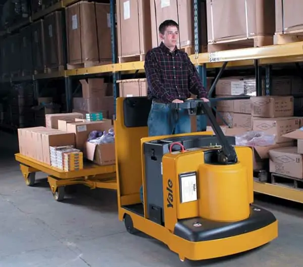 carrying stock on Center rider walkie in the warehouse